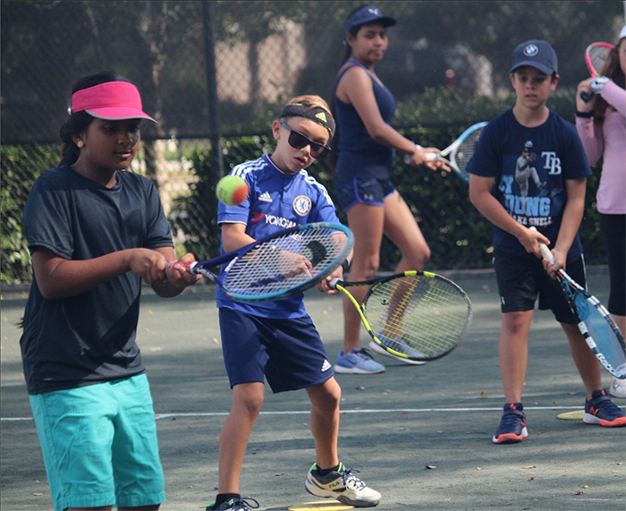 Kids junior tennis lessons progressive ball type instruction and learning for boys and girls ages 5 to 16 year olds